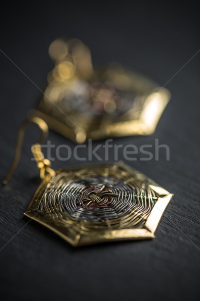 Hexagonal metal earring Stock photo © grafvision