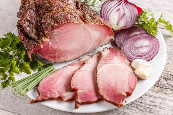 Afumat carne de porc condimente alb placă Imagine de stoc © grafvision