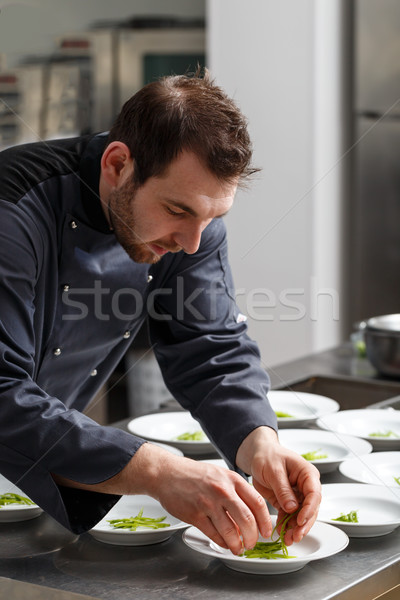 Chef cooking for lunch Stock photo © grafvision