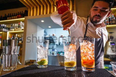 Bartender pours sparkling water Stock photo © grafvision