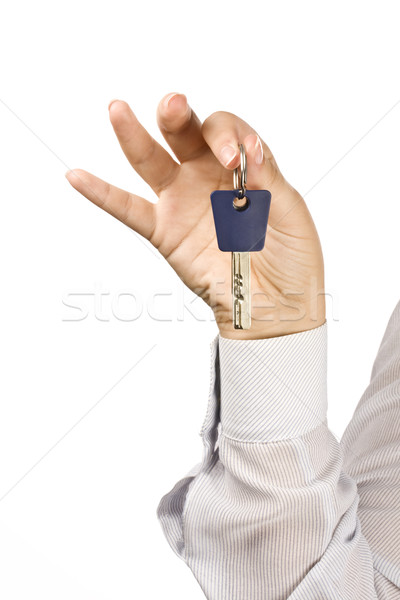 Woman holding a key Stock photo © grafvision