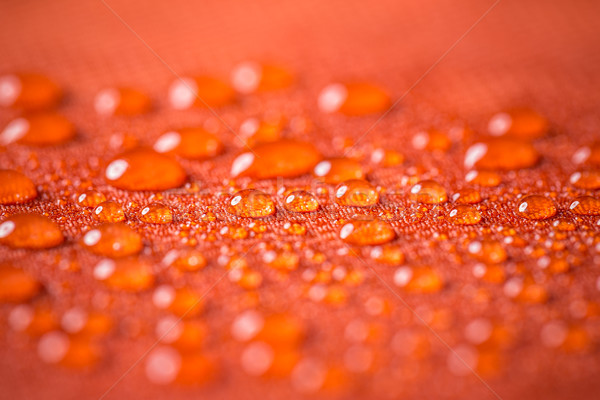 Imagine de stoc: Picături · picături · de · apă · apă · roşu · impermeabil · pânză