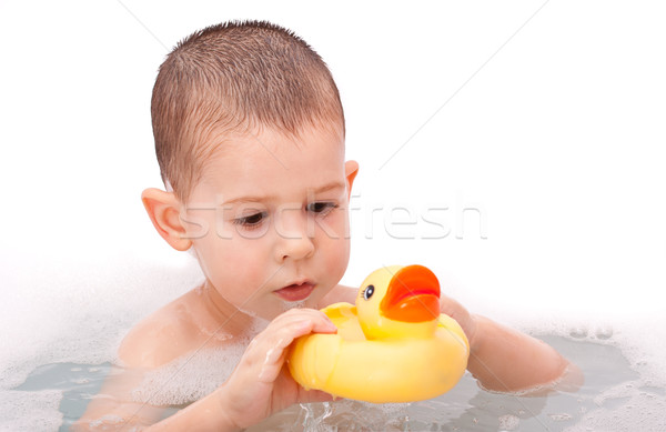 Boy playing in the water Stock photo © grafvision