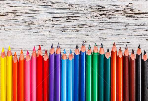 Crayons assortiment rangée école crayon art Photo stock © grafvision