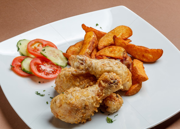 Gegrilde kip restaurant plantaardige dining aardappel maaltijd Stockfoto © grafvision