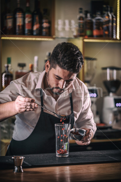 Bartender makes non-alcoholic pomegranate cocktail Stock photo © grafvision