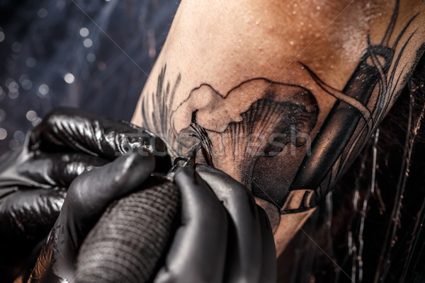 Stock photo: Professional artist making tattoo