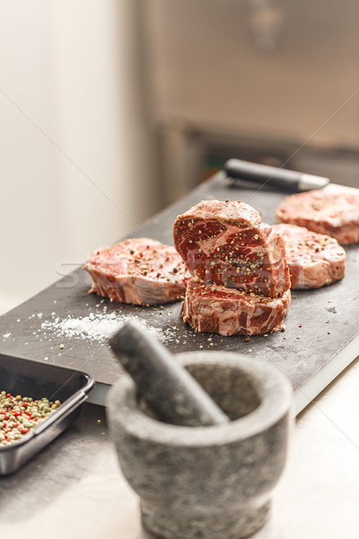 Nyers marhahús borda hús fűszer étterem Stock fotó © grafvision