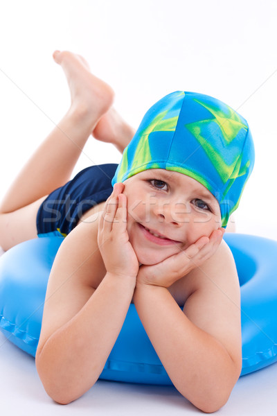 Stock photo: boy playing with blue life ring