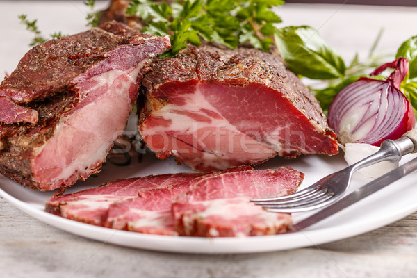 Stock photo: Sliced smoked pork meat