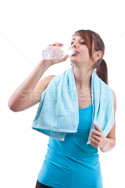 Сток-фото: привлекательная · девушка · питьевая · вода · портрет · изолированный · белый