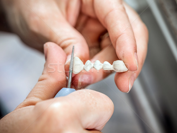 Dental technician molding teeth  Stock photo © grafvision