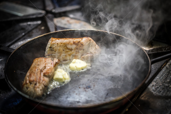 Vesepecsenye disznóhús vaj serpenyő konyha vacsora Stock fotó © grafvision
