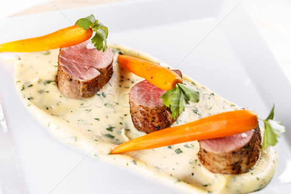 Amenda de mese masă carne de porc file morcovi Imagine de stoc © grafvision
