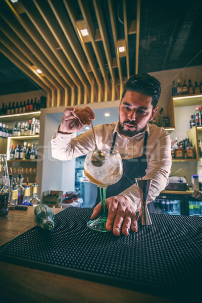 Bartender is stirring cocktail Stock photo © grafvision