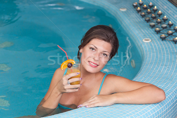 女子 享受 維他命 飲料 按摩浴池 年輕 商業照片 © grafvision