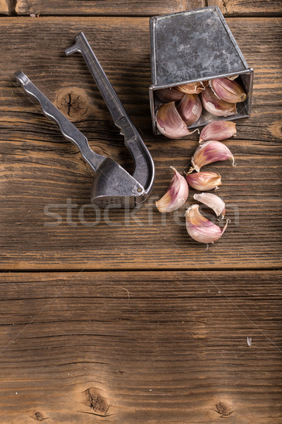 Fokhagyma sajtó fa deszka szín acél főzés Stock fotó © grafvision