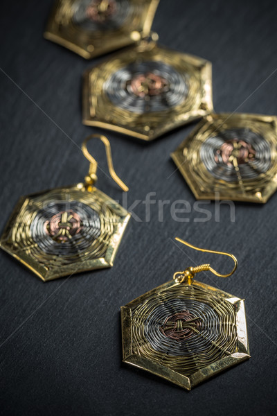 Elegant metal earrings Stock photo © grafvision