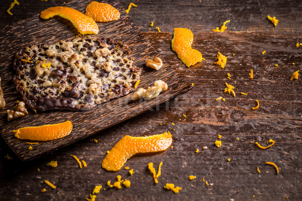 Kandyzowany pomarańczowy ciasto orzechy czekolady tle Zdjęcia stock © grafvision