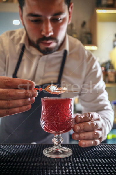 Bartender creates cocktail Stock photo © grafvision
