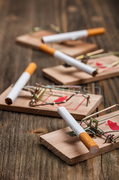 Cigarette in mousetrap  Stock photo © grafvision