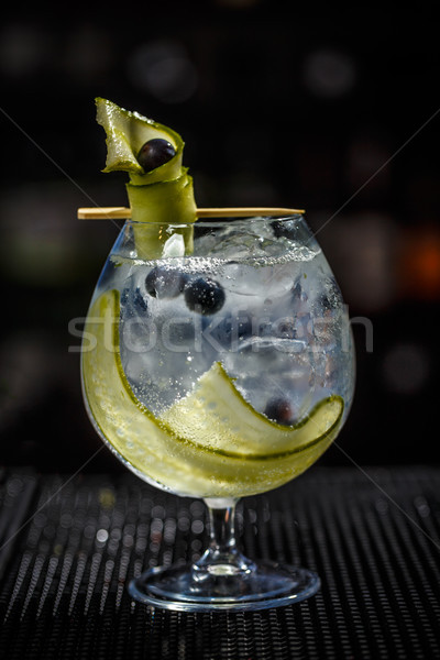 Gin koktél uborka fekete ribiszke jég Stock fotó © grafvision