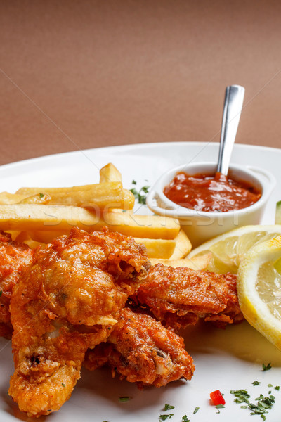 Spicy breaded chicken legs Stock photo © grafvision