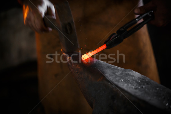 Smithy on the anvil Stock photo © grafvision