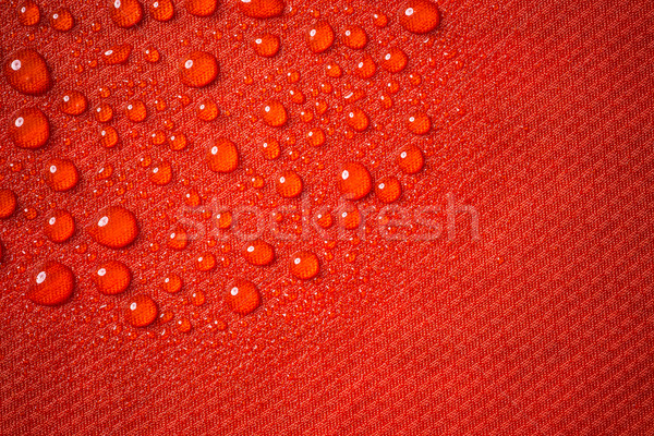 Roşu impermeabil ţesătură apă margele Imagine de stoc © grafvision