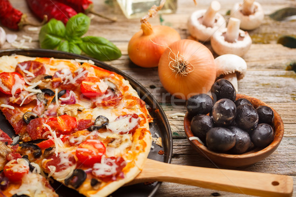 Homemade pizza Stock photo © grafvision