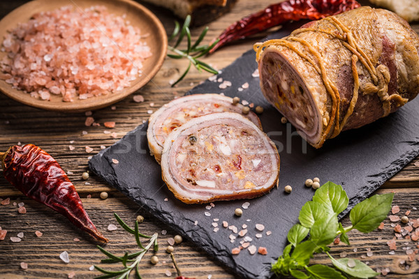 Rolled stuffed roast pork Stock photo © grafvision