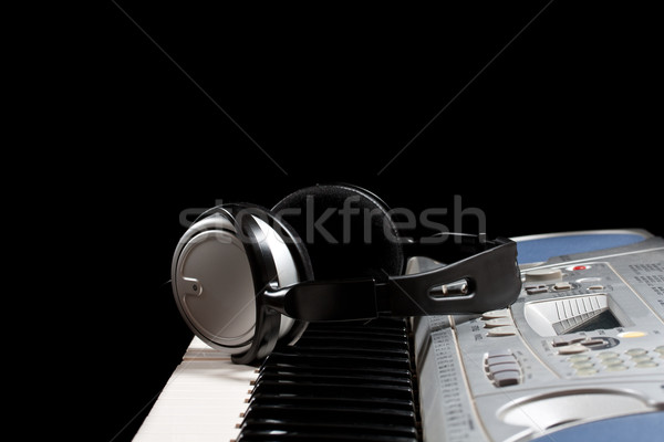 Headphones on keyboard Stock photo © grafvision