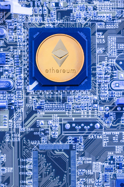 Printed circuit board with a processor and a ethereum symbol Stock photo © grafvision