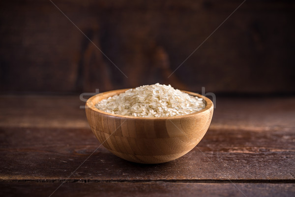 Riz bois bol plein basmati table [[stock_photo]] © grafvision