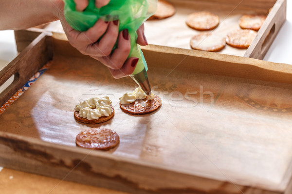 Pastry chef is decorating a mille-feuille Stock photo © grafvision
