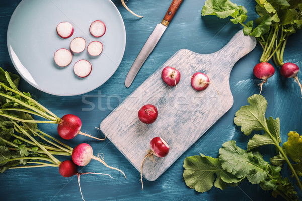 Sliced and whole fresh radishes Stock photo © grafvision