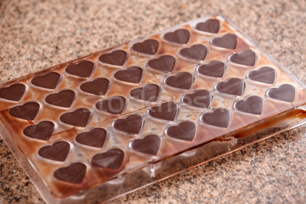 Szív alakú penész készít csokoládé Stock fotó © grafvision