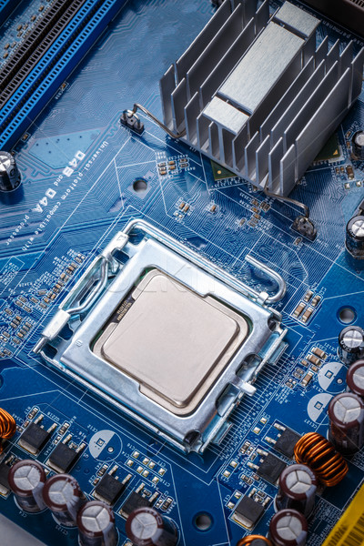 Placa de circuito processador eletrônico fundo azul Foto stock © grafvision