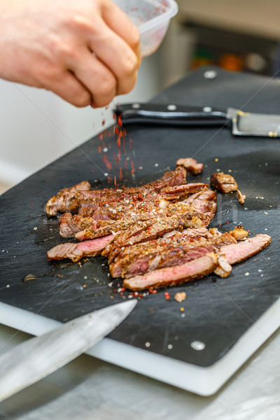 Szakács öntet pörkölt disznóhús steak piros Stock fotó © grafvision