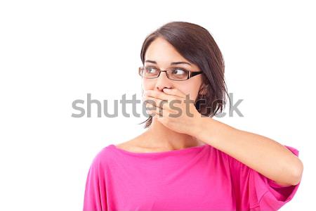 Nő befogja száját meglepődött fiatal nő kéz másfelé néz Stock fotó © grafvision