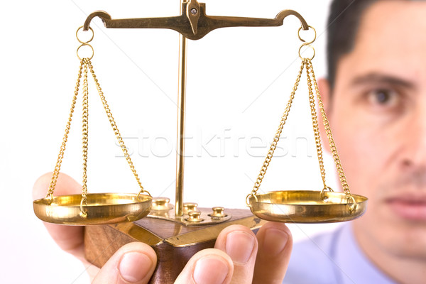 Gerechtigkeit Maßstab Geschäftsmann halten isoliert weiß Stock foto © grafvision
