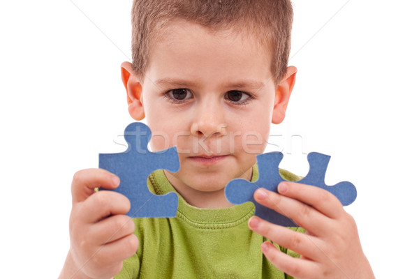 Boy with puzzles Stock photo © grafvision