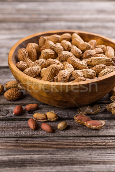 Foto stock: Amendoins · conchas · tigela · tabela · concha