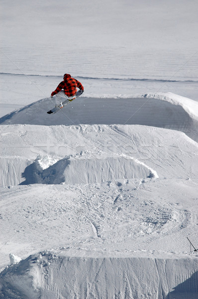 Springen freestyle Snowboarder Sport Berge rot Stock foto © gravityimaging