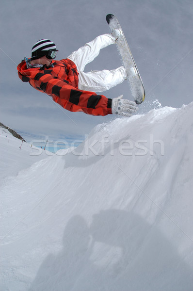 Jumping freestyle snowboarder Stock photo © gravityimaging