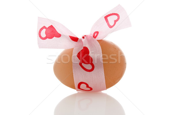 brown egg with a ribbon Stock photo © Grazvydas