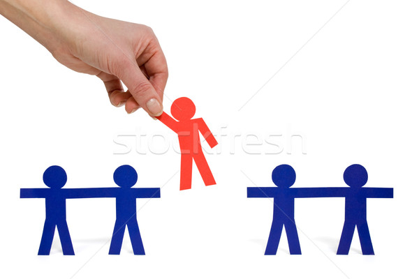 Stock photo: Choosing the red person from a group 