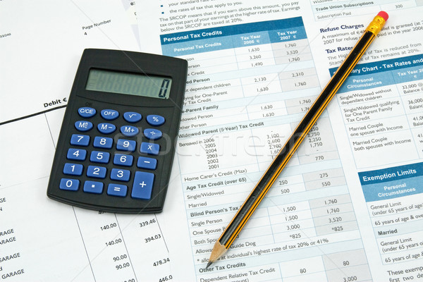 calculator,pencil and tax form Stock photo © Grazvydas