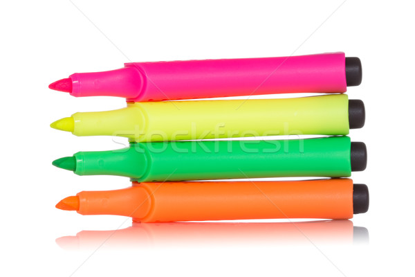 Cztery kolorowy wyróżnienia długopisy odizolowany biały Zdjęcia stock © Grazvydas