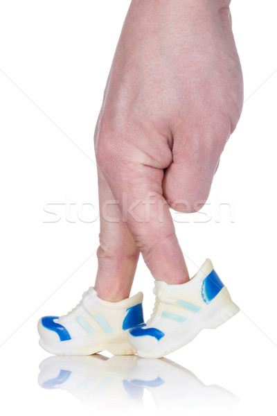 Ujjak visel sportok edzőcipő sétál fehér Stock fotó © Grazvydas